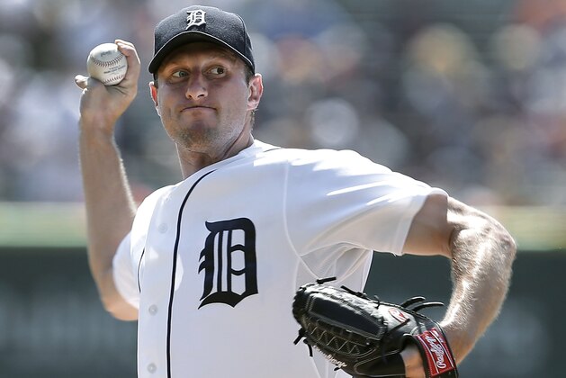 Detroit Tigers pitcher Max Scherzer throws against the Oakland Athletics in the first inning of a baseball game in Detroit, Thursday, Aug. 29, 2013.  (AP Photo/Paul Sancya)