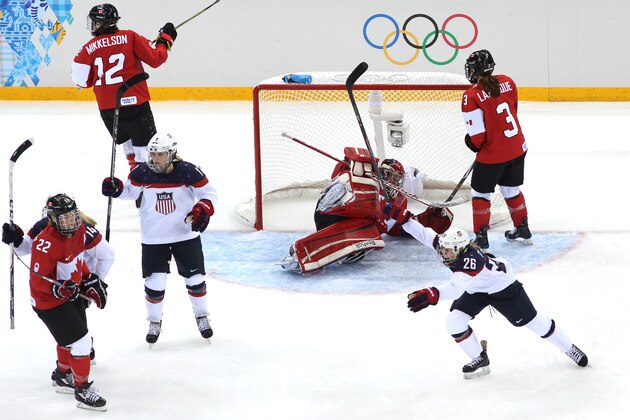 SOCHI, RUSSIA - FEBRUARY 12: Kendall Coyne #26 of the United States celebrates as Charline Labonte #32 of Canada allows a goal by Anne Schleper #15 in the third period during the Women's Ice Hockey Preliminary Round Group A game on day five of the Sochi 2014 Winter Olympics at Shayba Arena on February 12, 2014 in Sochi, Russia. (Photo by Bruce Bennett/Getty Images) SOCHI, RUSSIA - FEBRUARY 12: Kendall Coyne #26 of the United States celebrates as Charline Labonte #32 of Canada allows a goal by Anne Schleper #15 in the third period during the Women's Ice Hockey Preliminary Round Group A game on day five of the Sochi 2014 Winter Olympics at Shayba Arena on February 12, 2014 in Sochi, Russia. (Photo by Bruce Bennett/Getty Images)