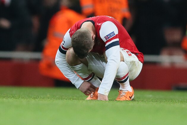 Arsenal's Jack Wilshere reacts after a Champions League, round of 16, first leg soccer match between Arsenal and Bayern Munich at the Emirates stadium in London, Wednesday, Feb. 19, 2014 .(AP Photo/Alastair Grant)