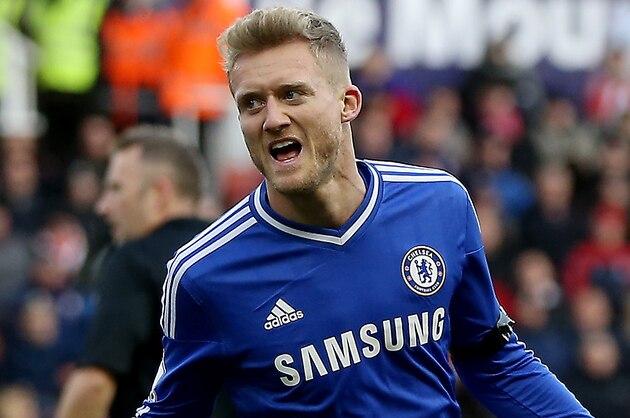STOKE ON TRENT, ENGLAND - DECEMBER 07:  Andre Schurrle of Chelsea celebrates after scoring their first goal during the Barclays Premier League match between Stoke City and Chelsea at Britannia Stadium on December 7, 2013 in Stoke on Trent, England.  (Photo by Scott Heavey/Getty Images)