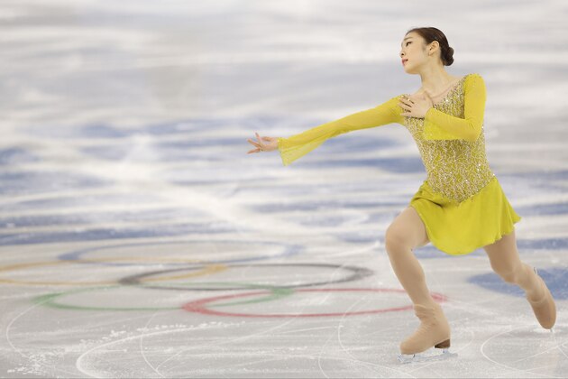 Yuna Kim of South Korea competes in the women's short program figure skating competition at the Iceberg Skating Palace during the 2014 Winter Olympics, Wednesday, Feb. 19, 2014, in Sochi, Russia. (AP Photo/Vadim Ghirda)