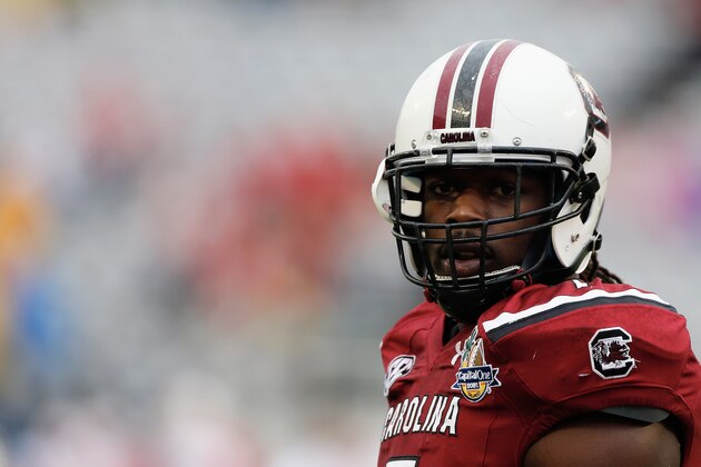 ORLANDO, FL - JANUARY 01:  Jadeveon Clowney #7 of the South Carolina Gamecocks works out on the field before the start of their game against the Wisconsin Badgers at the Capital One Bowl on January 1, 2014 in Orlando, Florida.  (Photo by Scott Halleran/Getty Images)