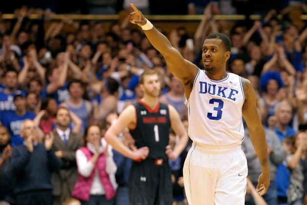 DURHAM, NC - FEBRUARY 15:  Tyler Thornton #3 of the Duke Blue Devils salutes the fans after a win over the Maryland Terrapins during their game at Cameron Indoor Stadium on February 15, 2014 in Durham, North Carolina. Duke won 69-67.  (Photo by Grant Halverson/Getty Images)