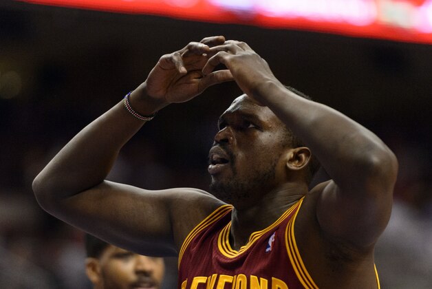 Feb 18, 2014; Philadelphia, PA, USA; Cleveland Cavaliers forward Luol Deng (9) reacts to a foul call during the first quarter against the Philadelphia 76ers at the Wells Fargo Center. The Cavaliers defeated the Sixers 114-85. Mandatory Credit: Howard Smith-USA TODAY Sports