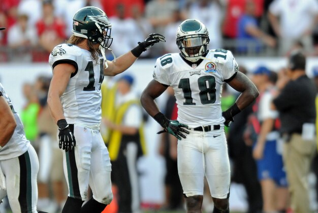 Dec 9, 2012; Tampa FL, USA; Philadelphia Eagles wide receiver Jeremy Maclin (18) and wide receiver Riley Cooper (14) during a game against the Tampa Bay Buccaneers at Raymond James Stadium. Mandatory Credit: Steve Mitchell-USA TODAY Sports