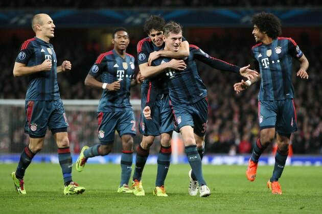 Munich's Toni Kroos, front celebrates his side's opening goal withArjen Robben, David Alaba, Javier Martinez and Dante, from left, during a Champions League, round of 16, first leg soccer match between Arsenal and Bayern Munich at the Emirates stadium in London, Wednesday, Feb. 19, 2014 .(AP Photo/Alastair Grant) Munich's Toni Kroos, front celebrates his side's opening goal withArjen Robben, David Alaba, Javier Martinez and Dante, from left, during a Champions League, round of 16, first leg soccer match between Arsenal and Bayern Munich at the Emirates stadium in London, Wednesday, Feb. 19, 2014 .(AP Photo/Alastair Grant)