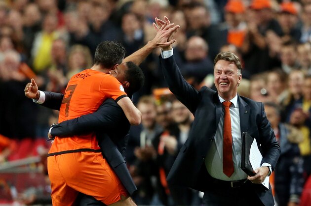 AMSTERDAM, NETHERLANDS - OCTOBER 11:  Robin van Persie of Holland celebrates with Patrick Kluivert and manager Luis van Gaal after scoring their fourth goal during the FIFA 2014 World Cup Qualifing match between Holland and Hungary at Amsterdam Arena on October 11, 2013 in Amsterdam, Netherlands.  (Photo by Scott Heavey/Getty Images)