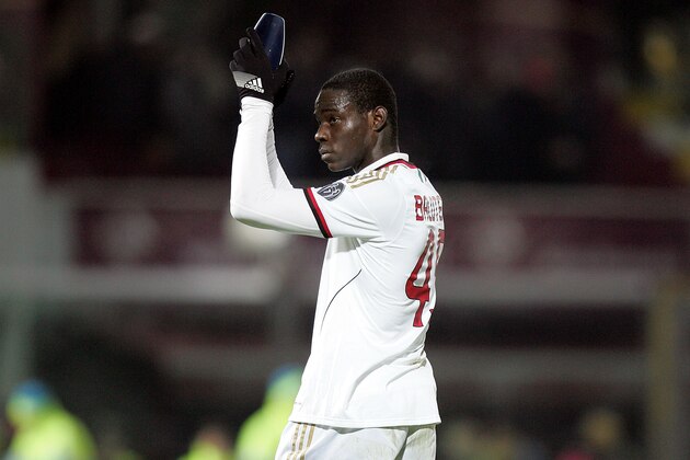 LIVORNO, ITALY - DECEMBER 07: Mario Balotelli of AC Milan in action during the Serie A match between AS Livorno and AC Milan at Stadio Armando Picchi on December 7, 2013 in Livorno, Italy.  (Photo by Gabriele Maltinti/Getty Images)