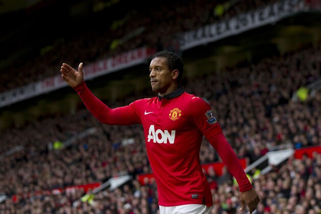 Manchester United's Nani prepares to take a corner during his team's English Premier League soccer match against Newcastle at Old Trafford Stadium, Manchester, England, Wednesday Dec. 7, 2013. (AP Photo/Jon Super)