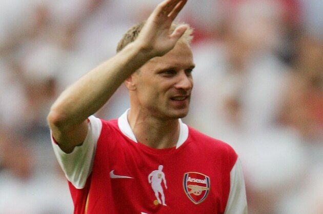 LONDON - JULY 22:  Dennis Bergkamp of Arsenal waves farewell to the fans, following his final game during the Dennis Bergkamp testimonial match between Arsenal and Ajax at the Emirates Stadium on July 22, 2006 in London, England.  (Photo by Jamie McDonald/Getty Images)