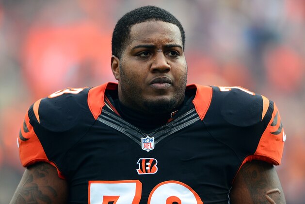 Dec 29, 2013; Cincinnati, OH, USA; Cincinnati Bengals tackle Anthony Collins (73) against the Baltimore Ravens at Paul Brown Stadium. Bengals defeated the Ravens 34-17. Mandatory Credit: Andrew Weber-USA TODAY Sports