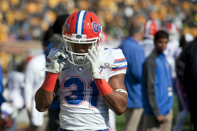 Florida's Cody Riggs walks off the field after being charged with targeting and ejected early in the first quarter of an NCAA college football game against Missouri Saturday, Oct. 19, 2013, in Columbia, Mo. Missouri won 36-17. (AP Photo/L.G. Patterson)