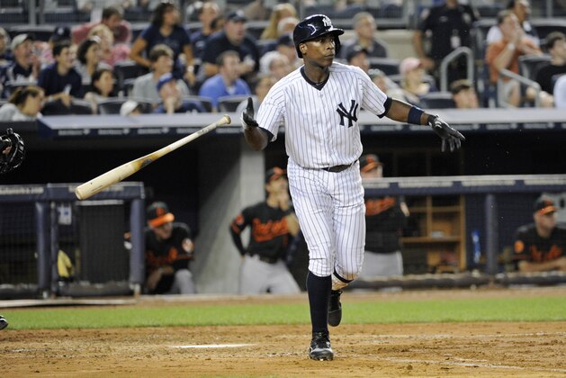 New York Yankees' Alfonso Soriano flips his bat after hitting a two-run home run during the fourth inning of a baseball game against the Baltimore Orioles Friday, Aug. 30, 2013, at Yankee Stadium in New York. (AP Photo/Bill Kostroun)