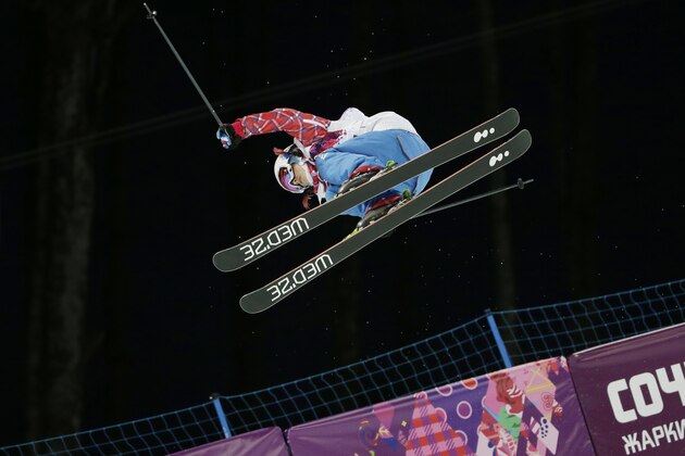 France's Marie Martinod gets air during women's ski halfpipe qualifying at the Rosa Khutor Extreme Park, at the 2014 Winter Olympics, Thursday, Feb. 20, 2014, in Krasnaya Polyana, Russia. (AP Photo/Andy Wong)