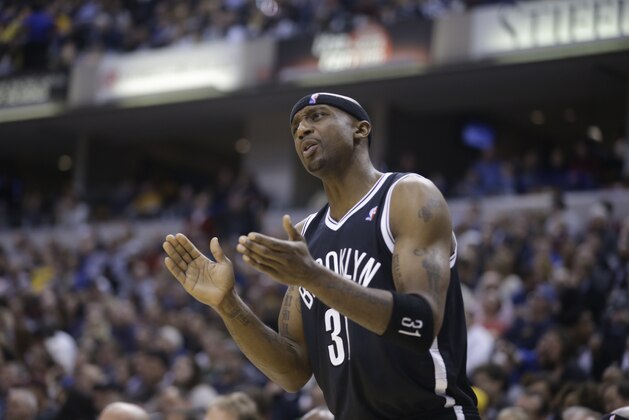 Brooklyn Nets guard Jason Terry yells from the bench in the second half of an NBA basketball game against the Indiana Pacers in Indianapolis, Saturday, Feb. 1, 2014. The Pacers defeated the Nets 97-96. (AP Photo/Michael Conroy)
