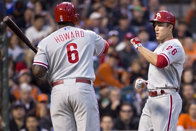 SAN FRANCISCO, CA - MAY 06: Chase Utley #26 of the Philadelphia Phillies is congratulated by Ryan Howard #6 after scoring a run on a wild pitch by Madison Bumgarner #40 of the San Francisco Giants (not pictured) during the second inning at AT&T Park on May 6, 2013 in San Francisco, California. (Photo by Jason O. Watson/Getty Images)