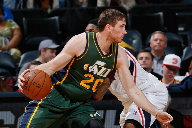 ATLANTA, GA - DECEMBER 20:  Gordon Hayward #20 of the Utah Jazz against Louis Williams #3 of the Atlanta Hawks at Philips Arena on December 20, 2013 in Atlanta, Georgia.  NOTE TO USER: User expressly acknowledges and agrees that, by downloading and or using this photograph, User is consenting to the terms and conditions of the Getty Images License Agreement.  (Photo by Kevin C. Cox/Getty Images)