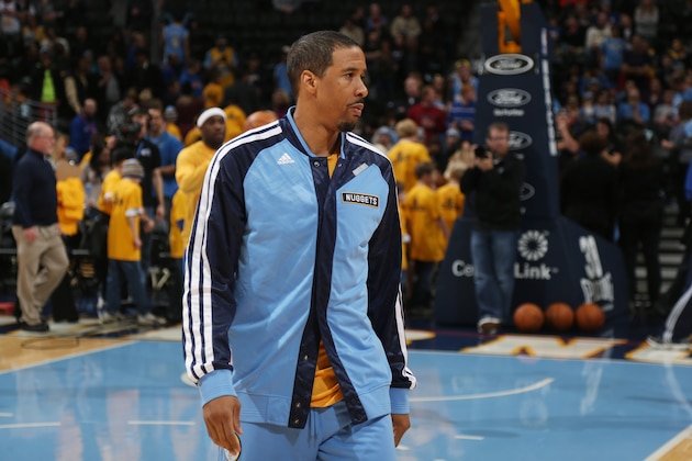 Denver Nuggets guard Andre Miller warms up before facing the Philadelphia 76ers in the first quarter of an NBA basketball game in Denver on Wednesday, Jan. 1, 2014. (AP Photo/David Zalubowski)