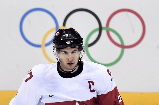 Canada's Sidney Crosby takes part in a warm-up ahead of quarterfinal hockey action against Latvia at the 2014 Sochi Winter Olympics in Sochi, Russia on Wednesday, Feb. 19, 2014. (AP Photo/The Canadian Press, Nathan Denette)