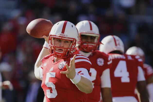 Nebraska quarterback Johnny Stanton (5) throws during warmups as Michigan State and Nebraska prepare to square off in an NCAA college football game in Lincoln, Neb., Saturday, Nov. 16, 2013. (AP Photo/Nati Harnik)