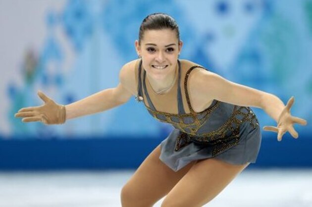 Adelina Sotnikova of Russia competes in the women's free skate figure skating finals at the Iceberg Skating Palace during the 2014 Winter Olympics, Thursday, Feb. 20, 2014, in Sochi, Russia. (AP Photo/Ivan Sekretarev)