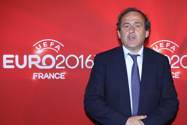 UEFA President and former French soccer star Michel Platini poses for photographers before a press conference on the preparations for the European Championship 2016 being held in France, in Lille, France, Friday, May 3, 2013. (AP Photo/Michel Spingler)