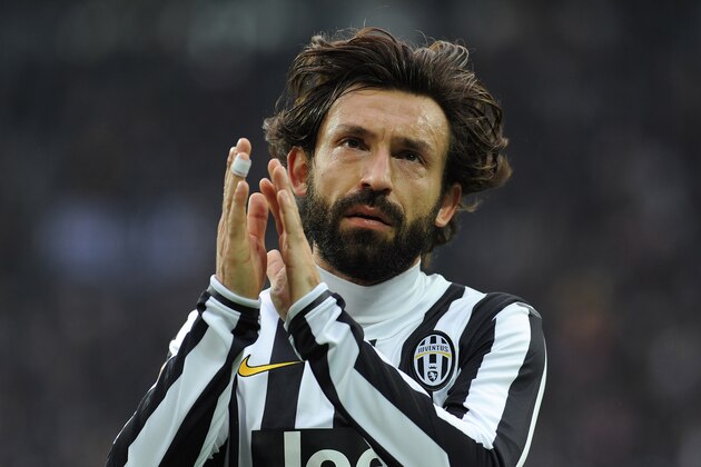TURIN, ITALY - FEBRUARY 16:  Andrea Pirlo of Juventus applauds during the Serie A match between Juventus and AC Chievo Verona at Juventus Arena on February 16, 2014 in Turin, Italy.  (Photo by Valerio Pennicino/Getty Images)
