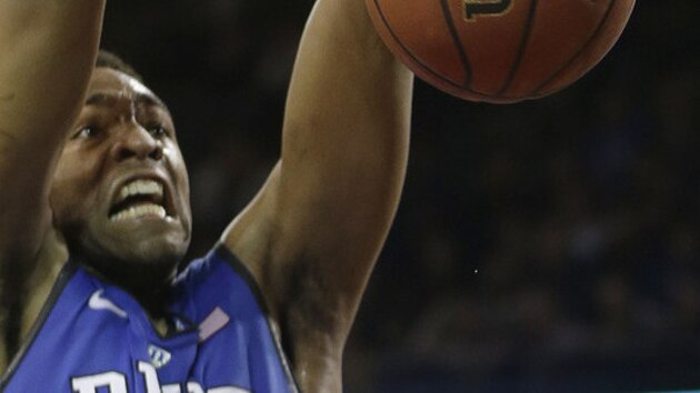Duke forward Jabari Parker (1) dunks  during the second half of their NCAA mens college basketball game against Boston College on the Boston College campus in Boston, Saturday, Feb. 8, 2014. Duke defeated Boston College 89-68. (AP Photo/Stephan Savoia)