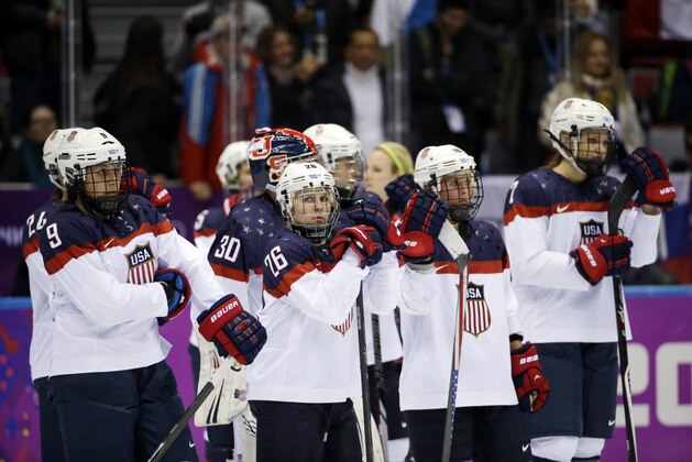 Members of team USA react after Canada won 3-2 in overtime of the gold medal women's ice hockey game at the 2014 Winter Olympics, Wednesday, Feb. 19, 2014, in Sochi, Russia. (AP Photo/David Goldman) Members of team USA react after Canada won 3-2 in overtime of the gold medal women's ice hockey game at the 2014 Winter Olympics, Wednesday, Feb. 19, 2014, in Sochi, Russia. (AP Photo/David Goldman)