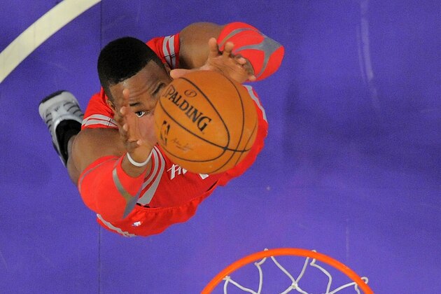Houston Rockets center Dwight Howard grabs a rebound during the first half of an NBA basketball game against the Los Angeles Lakers, Wednesday, Feb. 19, 2014, in Los Angeles. (AP Photo/Mark J. Terrill)