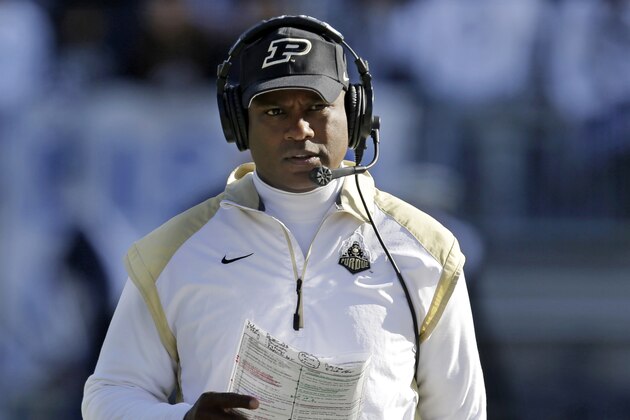 Purdue coach Darrell Hazell walks the sidelines during the second quarter of an NCAA college football game against Penn State in State College, Pa., Saturday, Nov. 16, 2013. Penn State won 45-21. (AP Photo/Gene J Puskar)