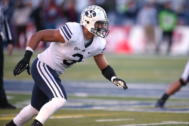 BYU's Kyle Van Noy competes in an NCAA college football game against Nevada, in Reno, Nev., on Saturday, Nov. 30, 2013. (AP Photo/Cathleen Allison)