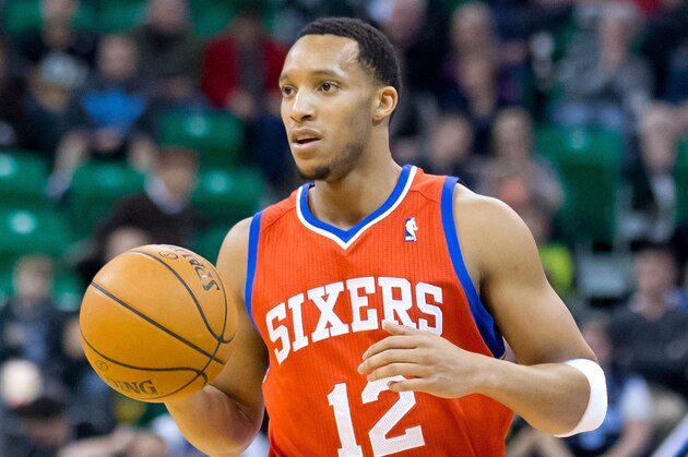 Feb 12, 2014; Salt Lake City, UT, USA; Philadelphia 76ers small forward Evan Turner (12) dribbles up the court during the first quarter against the Utah Jazz at EnergySolutions Arena. Mandatory Credit: Russ Isabella-USA TODAY Sports