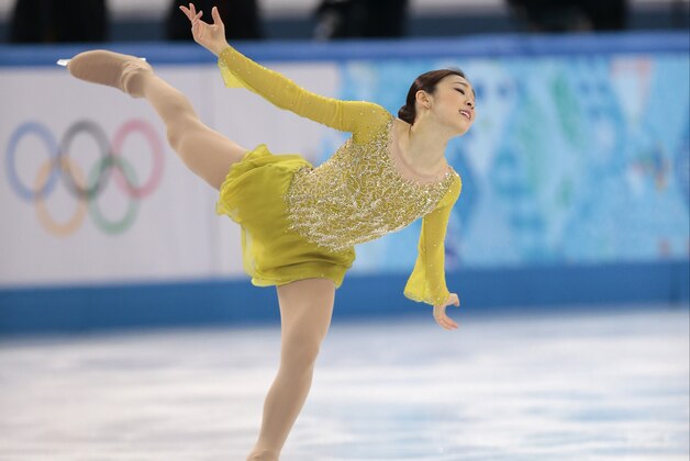 Yuna Kim of South Korea competes in the women's short program figure skating competition at the Iceberg Skating Palace during the 2014 Winter Olympics, Wednesday, Feb. 19, 2014, in Sochi, Russia. (AP Photo/Ivan Sekretarev)