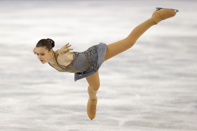 Adelina Sotnikova of Russia competes in the women's free skate figure skating finals at the Iceberg Skating Palace during the 2014 Winter Olympics, Thursday, Feb. 20, 2014, in Sochi, Russia. (AP Photo/Vadim Ghirda)