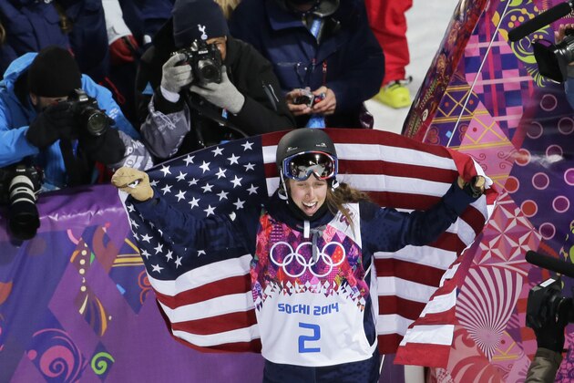 Maddie Bowman of the United States celebrates after winning the gold medal in the women's ski halfpipe final at the Rosa Khutor Extreme Park, at the 2014 Winter Olympics, Thursday, Feb. 20, 2014, in Krasnaya Polyana, Russia. (AP Photo/Andy Wong)