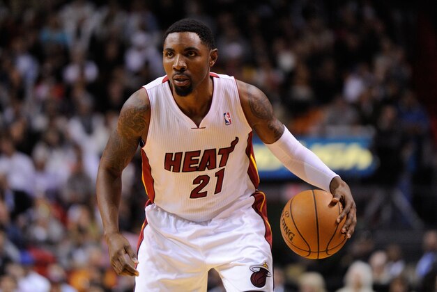 Jan 7, 2014; Miami, FL, USA; Miami Heat shooting guard Roger Mason Jr. (21) dribbles against the New Orleans Pelicans during the first half at American Airlines Arena. The Heat won 107-88. Mandatory Credit: Steve Mitchell-USA TODAY Sports