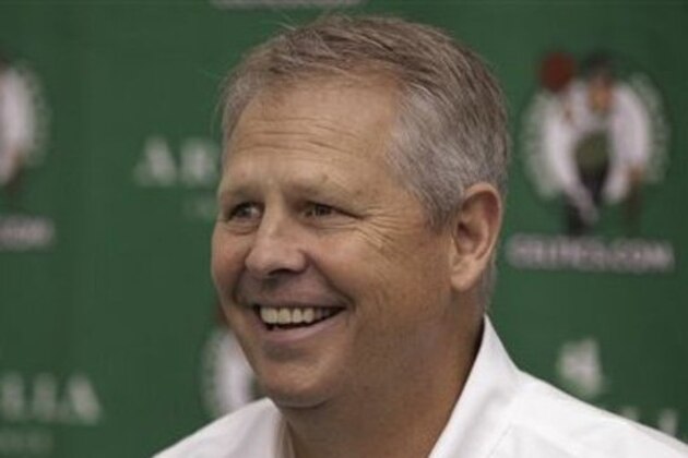 Danny Ainge, president of basketball operations for the Boston Celtics, answers a reporter's question during media day at the NBA basketball team's training center in Waltham, Mass., Friday, Sept. 28, 2012. (AP Photo/Stephan Savoia)