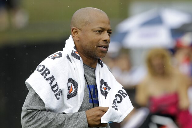 New York Giants general manager Jerry Reese wears a towel in a light rain during a practice at the New York Giants NFL football training camp in Albany, N.Y., Saturday, July 28, 2012. (AP Photo/Kathy Willens) New York Giants general manager Jerry Reese wears a towel in a light rain during a practice at the New York Giants NFL football training camp in Albany, N.Y., Saturday, July 28, 2012. (AP Photo/Kathy Willens)