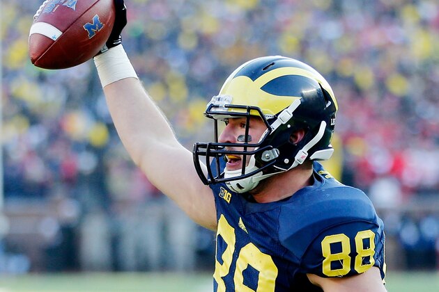 ANN ARBOR, MI - NOVEMBER 30:  Tight end Jake Butt #88 of the Michigan Wolverines celebrates a fourth quarter touchdown against the Ohio State Buckeyes during a game at Michigan Stadium on November 30, 2013 in Ann Arbor, Michigan.  (Photo by Gregory Shamus/Getty Images)