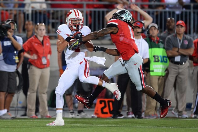 COLUMBUS, OH - SEPTEMBER 28:  Jared Abbrederis #4 of the Wisconsin Badgers pulls in a 36-yard touchdown pass in the first quarter as Bradley Roby #1 of the Ohio State Buckeyes defends at Ohio Stadium on September 28, 2013 in Columbus, Ohio.  (Photo by Jamie Sabau/Getty Images)