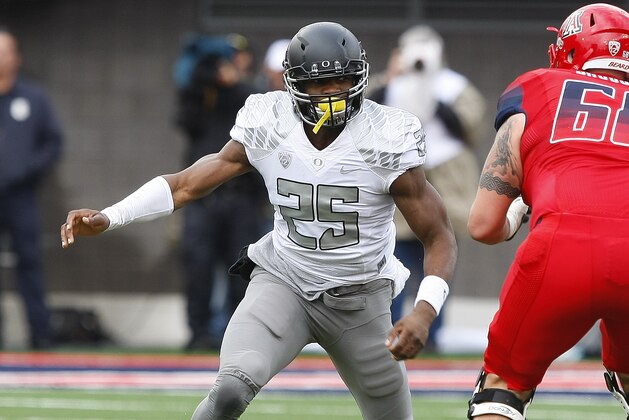 Oregon linebacker Boseko Lokombo (25) during the first half of an NCAA football game against Arizona, Saturday, Nov. 23, 2013, in Tucson, Ariz. (AP Photo/Rick Scuteri)