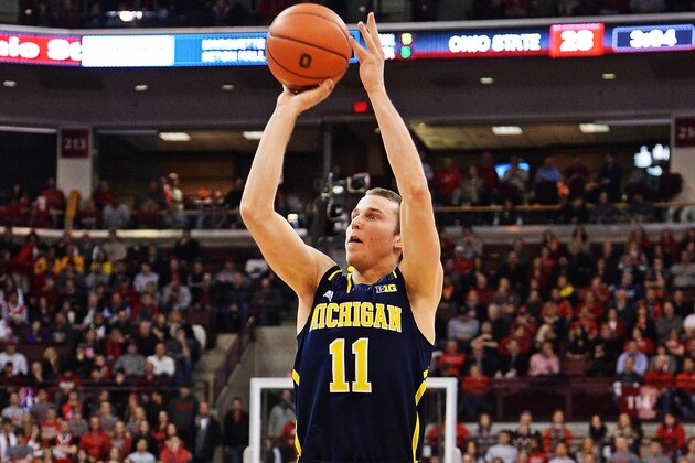COLUMBUS, OH - FEBRUARY 11:  Nik Stauskas #11 of the Michigan Wolverines shoots for two of his team high 15 points against the Ohio State Buckeyes in the first half on February 11, 2014 at Value City Arena in Columbus, Ohio. Michigan defeated Ohio State 70-60.  (Photo by Jamie Sabau/Getty Images)