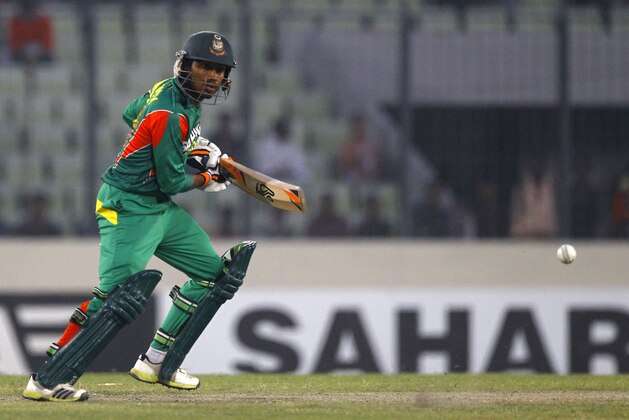 Bangladesh's Anamul Haque plays a shot  during their second one-day international (ODI) cricket match against Sri Lanka in Dhaka, Bangladesh, Thursday, Feb. 20, 2014. (AP Photo/A.M. Ahad)