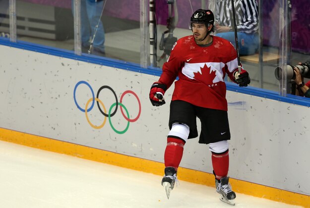 Feb 13, 2014; Sochi, RUSSIA; Canada defenseman Drew Doughty (8) celebrates after scoring a goal against Norway in a men's ice hockey preliminary round game during the Sochi 2014 Olympic Winter Games at Bolshoy Ice Dome. Mandatory Credit: Winslow Townson-USA TODAY Sports