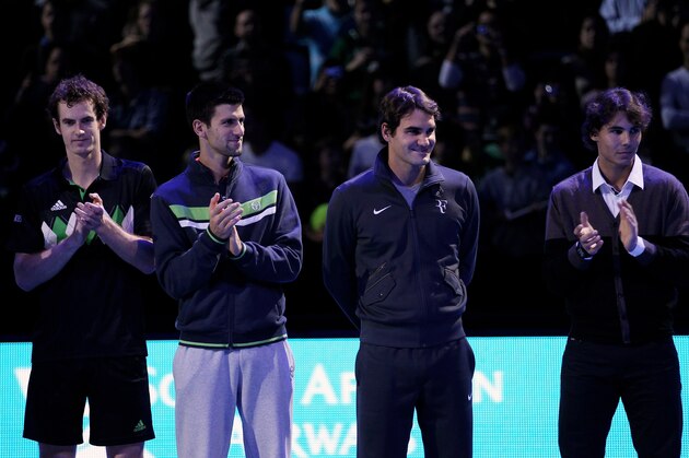 LONDON, ENGLAND - NOVEMBER 21:  (L-R) Andy Murray of Great Britain, Novak Djokovic of Siberia, Roger Federer of Switzerland and Rafael Nadal of Spain attend a ceremony for Carlos Moya's retirement during the Barclays ATP World Tour Finals at O2 Arena on November 21, 2010 in London, England.  (Photo by Clive Brunskill/Getty Images)