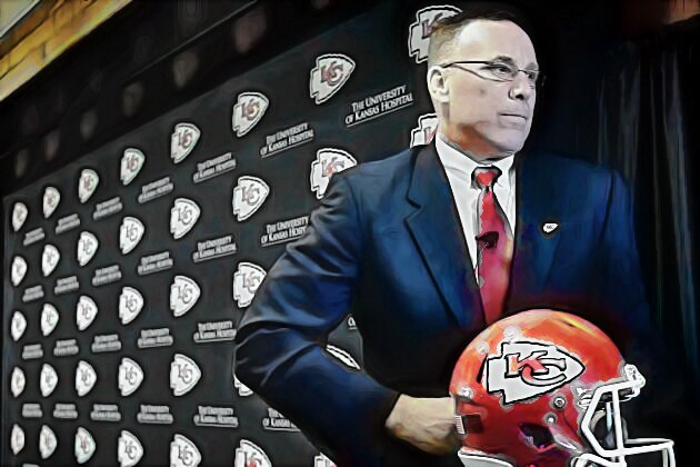 New Kansas City Chiefs general manager John Dorsey leaves the stage after an NFL football news conference Monday, Jan. 14, 2013, in Kansas City, Mo. (AP Photo/Charlie Riedel)