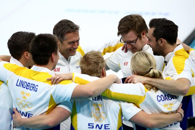 SOCHI, RUSSIA - FEBRUARY 21:  Team Sweden celebrates after defeating China during the Bronze medal game between China and Sweden at the Ice Cube Curling Center on February 21, 2014 in Sochi, Russia.  (Photo by Streeter Lecka/Getty Images)