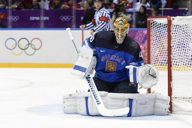 Feb 19, 2014; Sochi, RUSSIA; Finland goalie Tuukka Rask (40) makes a save against Russia in the men's ice hockey quarterfinals during the Sochi 2014 Olympic Winter Games at Bolshoy Ice Dome. Mandatory Credit: Scott Rovak-USA TODAY Sports