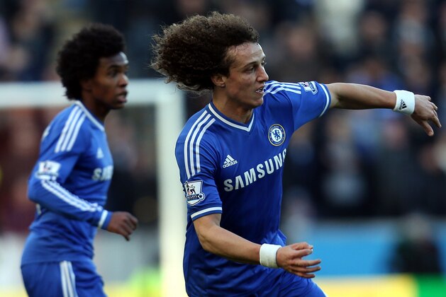 Chelsea's David Luiz control's the ball during their English Premier League soccer match against Hull City at the KC Stadium, Hull, England, Saturday, Jan. 11, 2014. (AP Photo/Scott Heppell)